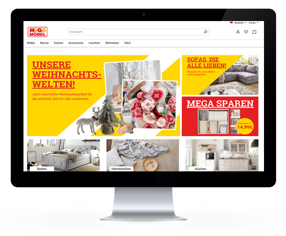 Bildschirm eines Computers zeigt die MegaSB Webseite mit Möbelangeboten und weihnachtlicher Dekoration.